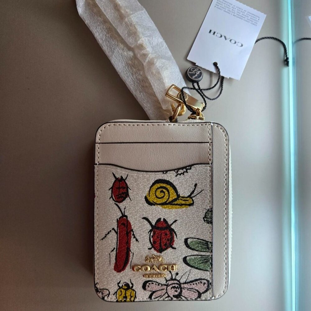Coach zip card case with Creature Print